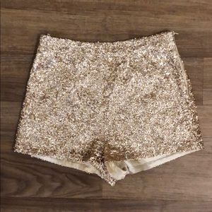 gold sparkly shorts